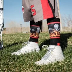 MadSportsStuff Lacrosse Socks With Lacrosse Sticks And Flaming Skull Athletic Crew Socks